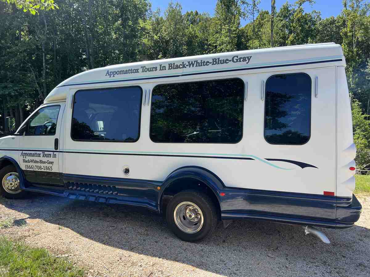 white bus with logo